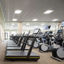 View of treadmills and stairclimbers lined up on the fitness floor in the Rancho SanClemente Life Time location.