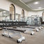 Weight benches and free weights located on the fitness floor in the Rancho San Clemente Life Time location.