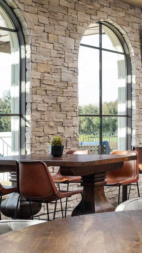 Tables located in the Life Time Lounge in the Rancho San Clemente club.