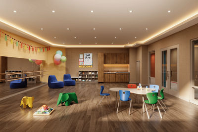 children's playroom with colorful chairs, elephant-shaped stools, a round table, and wall decorations