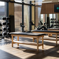 Stretch tables on the fitness floor at Life Time