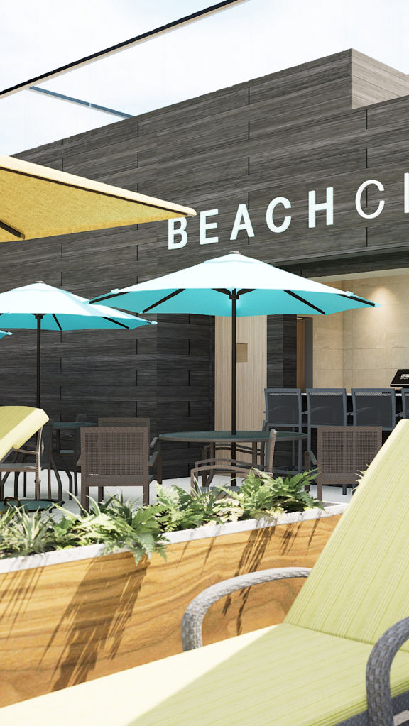 Tables, chairs, and umbrellas at the lifecafe poolside