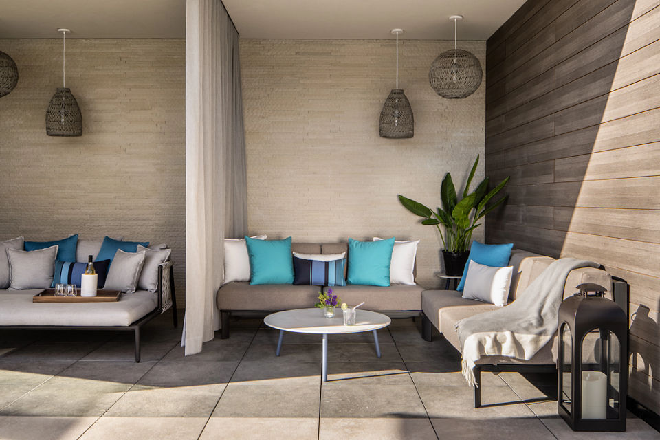 Outdoor rooftop pool seating area at the Life Time Scottsdale Fashion Square club location