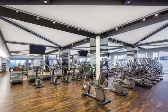 Cardio equipment on the fitness floor at the Life Time Sky club location