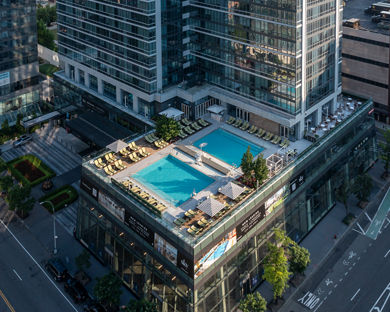 An aerial view of the rooftop pool deck at Life Time Sky