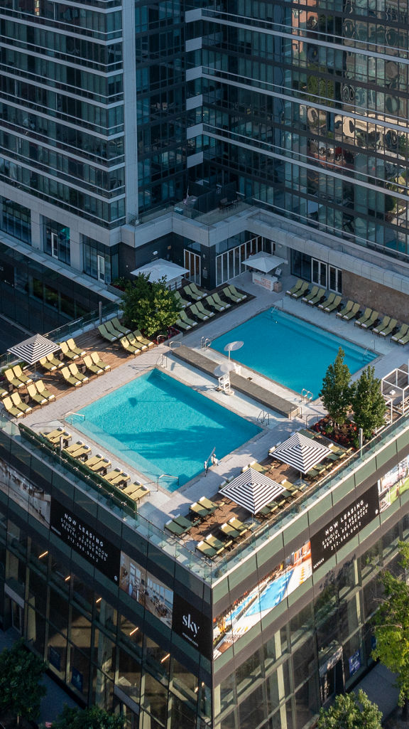 An aerial view of the rooftop pool deck at Life Time Sky