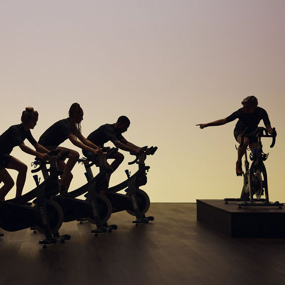 three life time memebers taking a cycling class