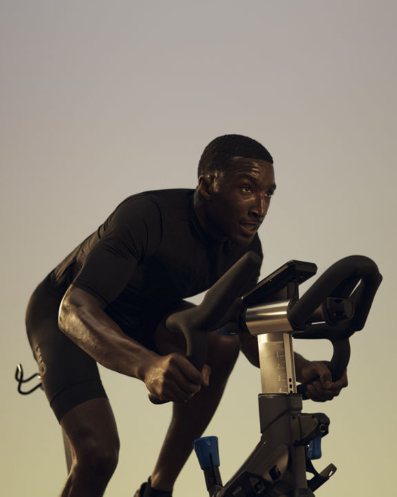 Cycling Life Time member riding in the PWR cycle spin class