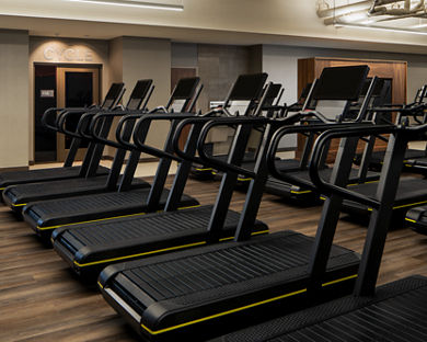 Treadmills on a fitness floor at a Life Time location