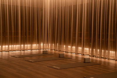 three yoga mats in a yoga studio