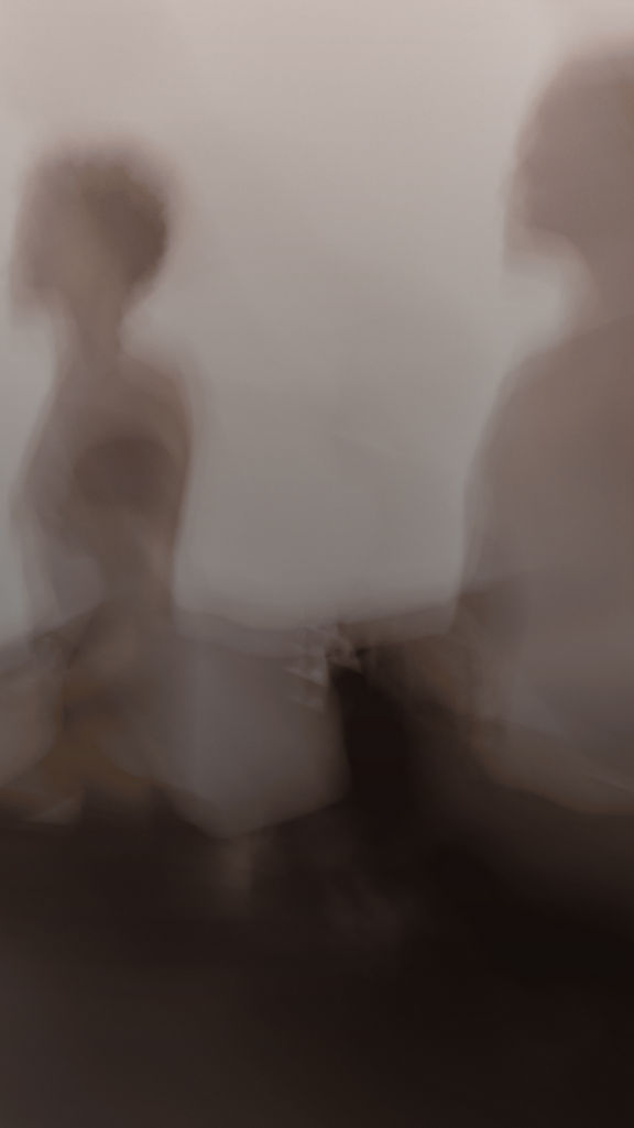 a group of people in a surrender yoga class