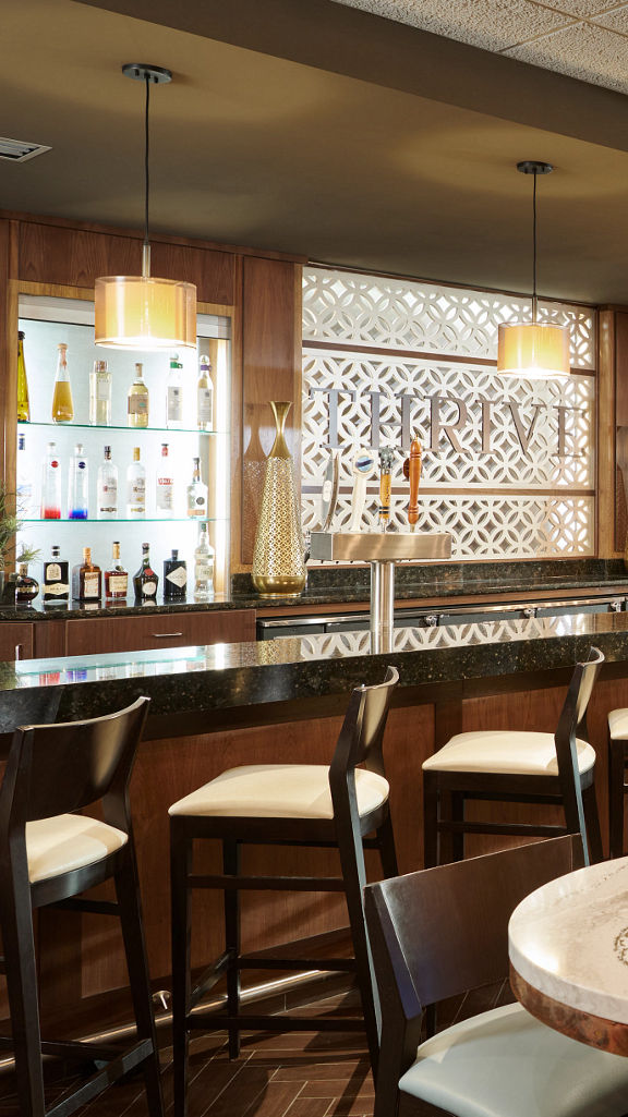 Bar and lounge seating at Life Time Target Center