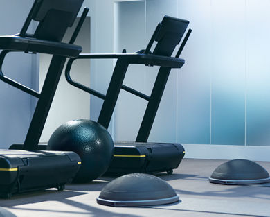 Treadmills and bosu balls from an UltraFit boutique group training class