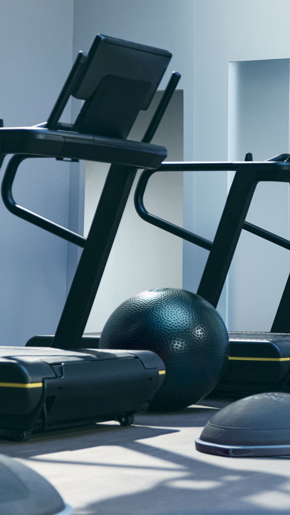 Treadmills and bosu balls from an UltraFit boutique group training class