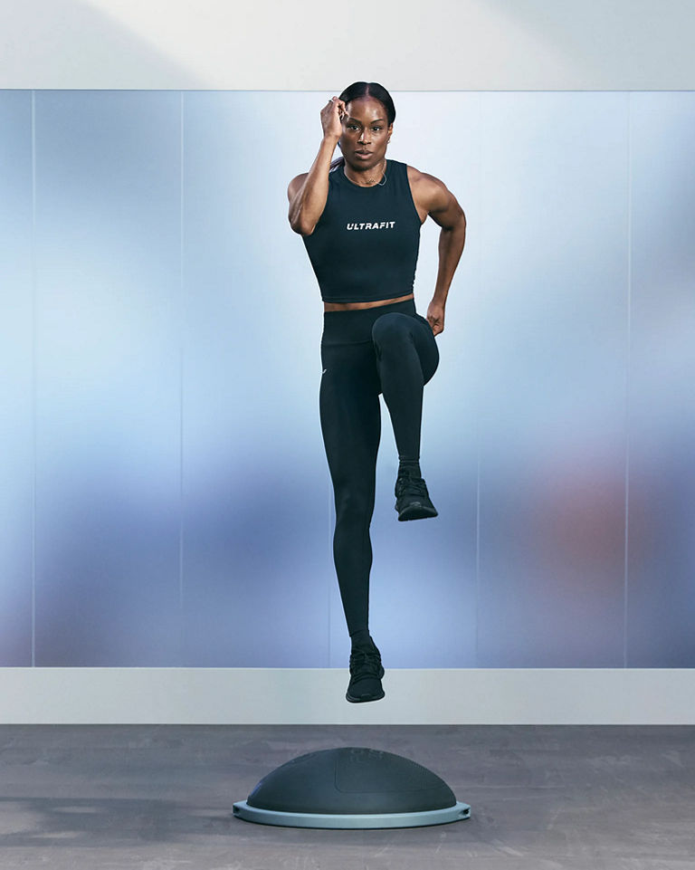 a woman in a reverse lunge skip pose