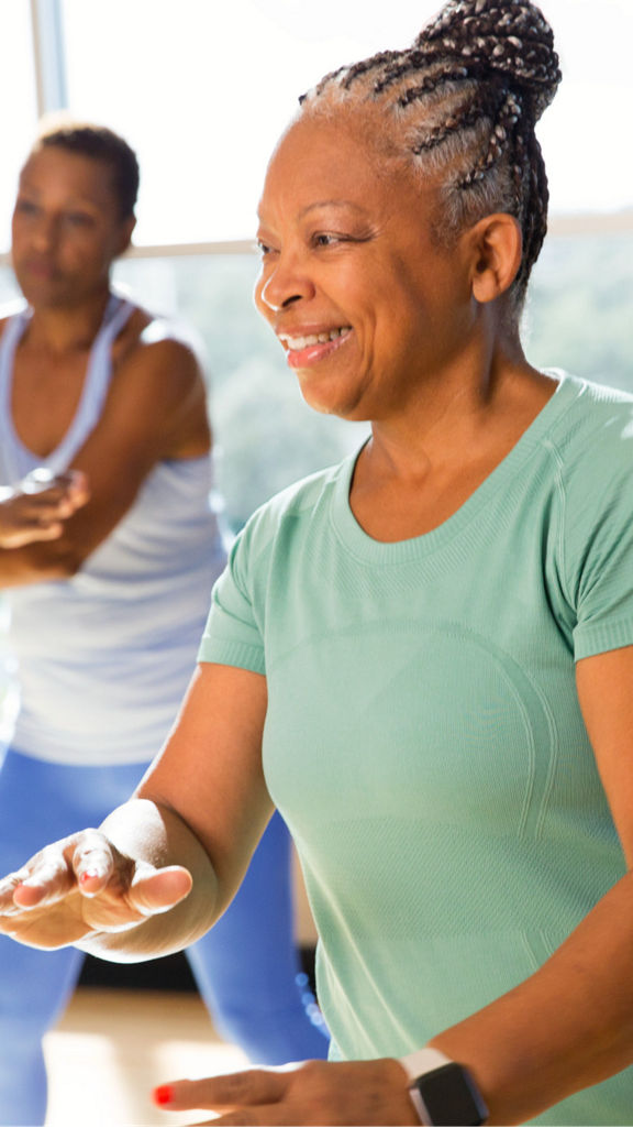 Active-agers participating in a group fitness class.